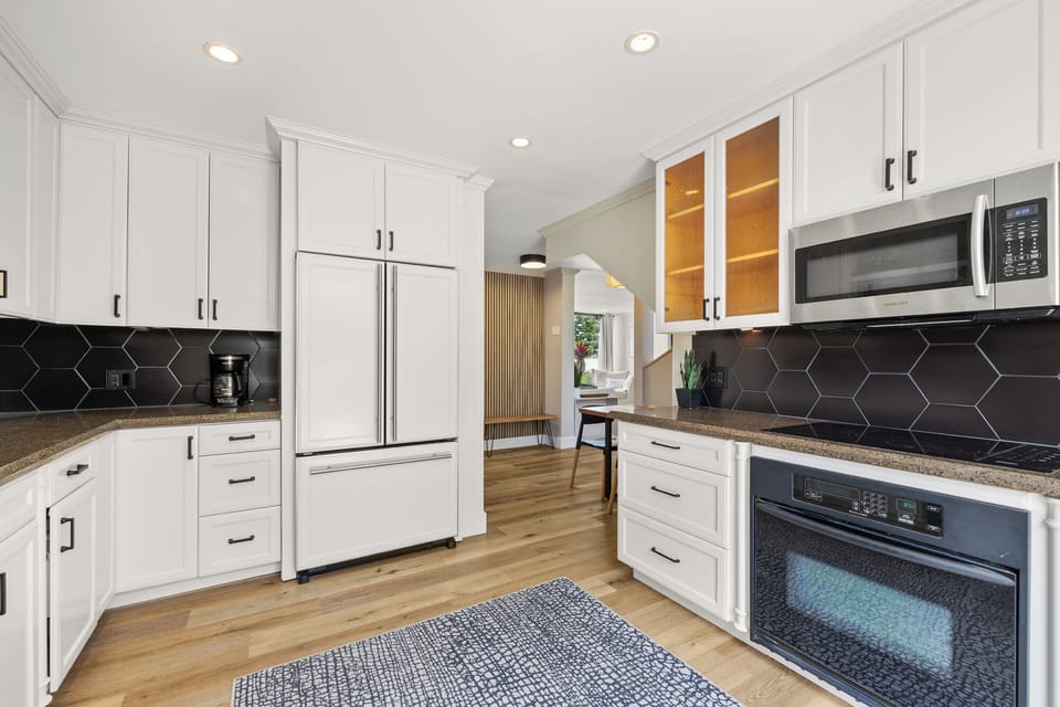 Large kitchen, fully stocked with all utensils, cooking pots and pans, coffee 