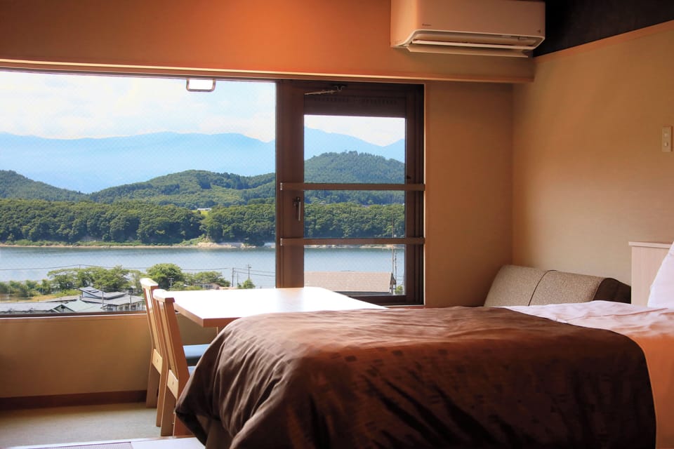 Japanese-style Twin Room, Non Smoking | In-room safe, WiFi (free), bed sheets