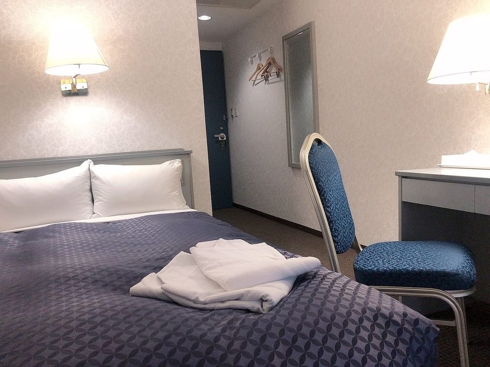 Premium bedding, down comforters, desk, blackout drapes