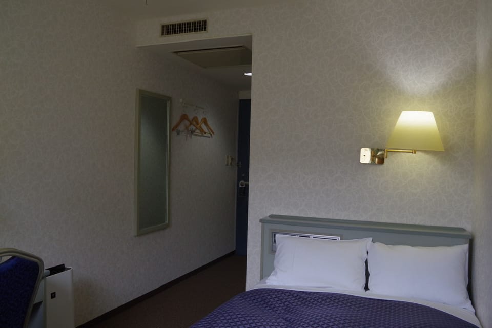 Premium bedding, down comforters, desk, blackout drapes