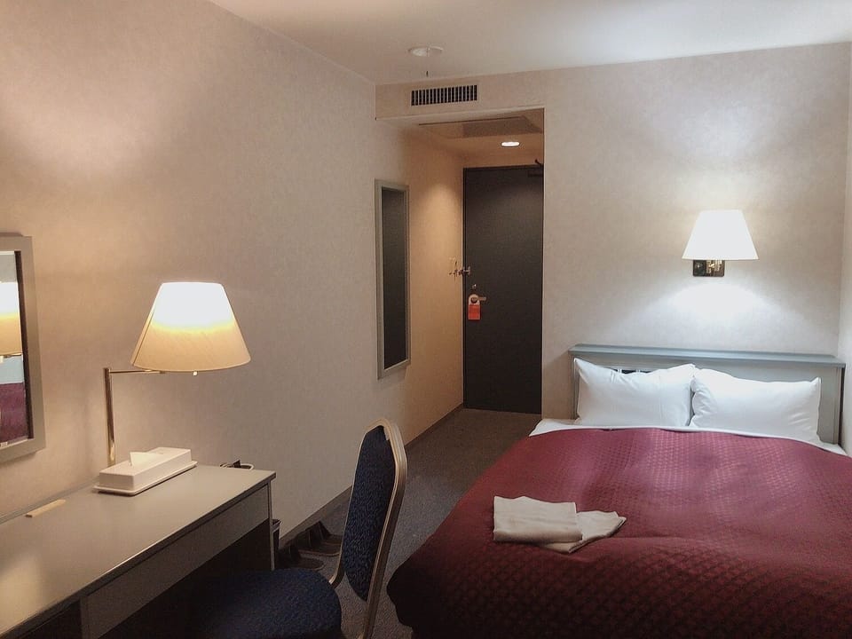 Premium bedding, down comforters, desk, blackout drapes