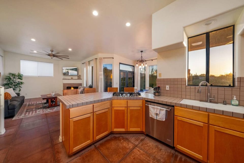 Spacious kitchen offers beautiful desert views and everything you`ll need for home-cooked meals