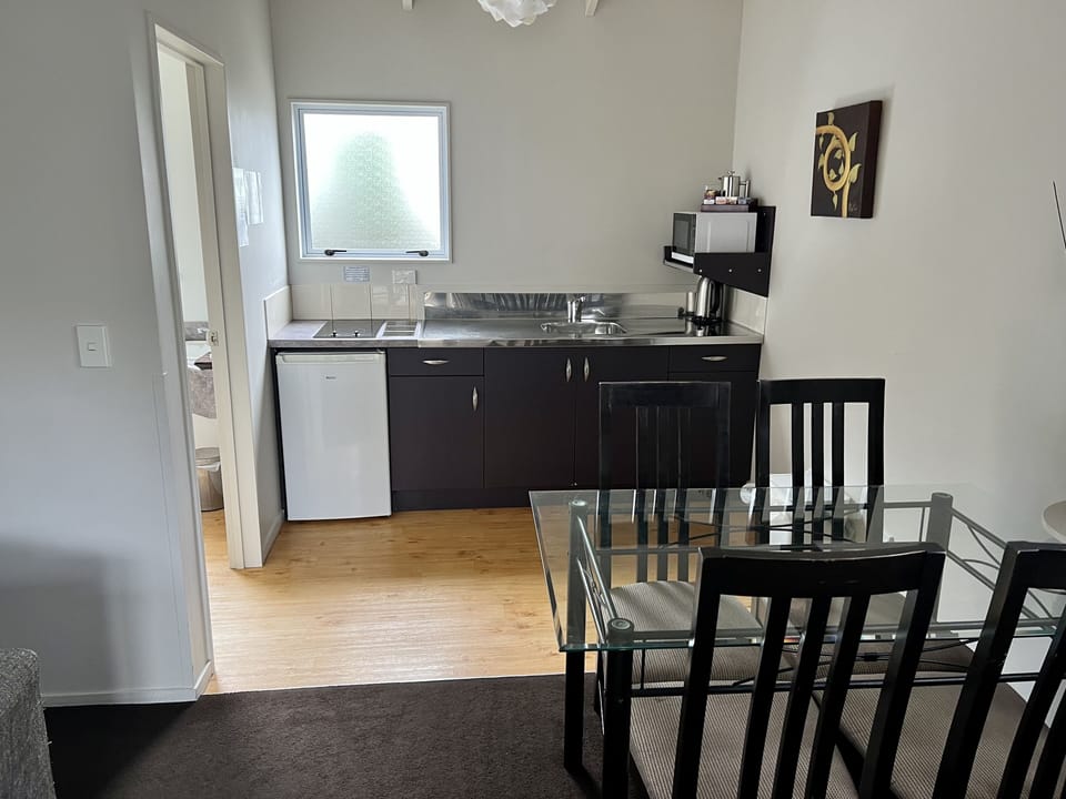 Family Room, 2 Bedrooms | Private kitchen | Fridge, microwave, coffee/tea maker