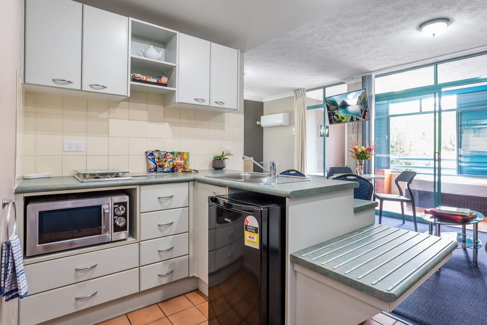 Family Room | Private kitchen | Coffee/tea maker, fridge, electric kettle