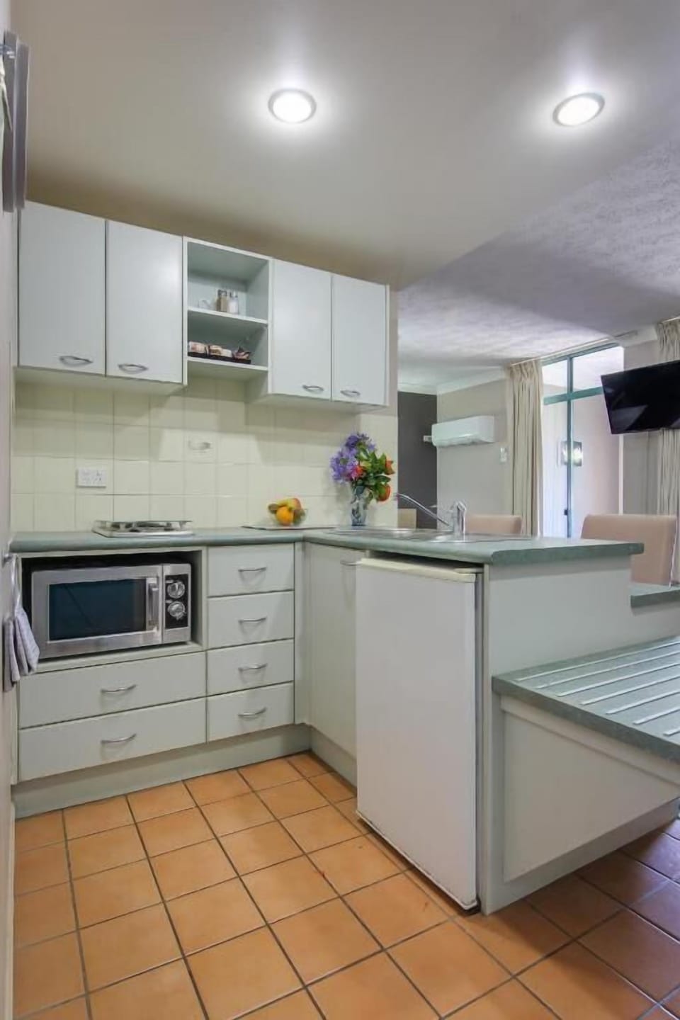 Family Room | Private kitchen | Coffee/tea maker, fridge, electric kettle