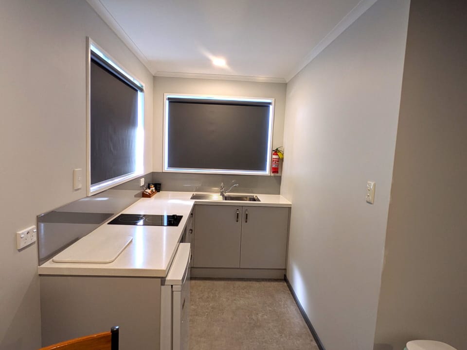 Two Bedroom Family Unit with Kitchenette | Private kitchen | Coffee/tea maker, fridge, electric kettle