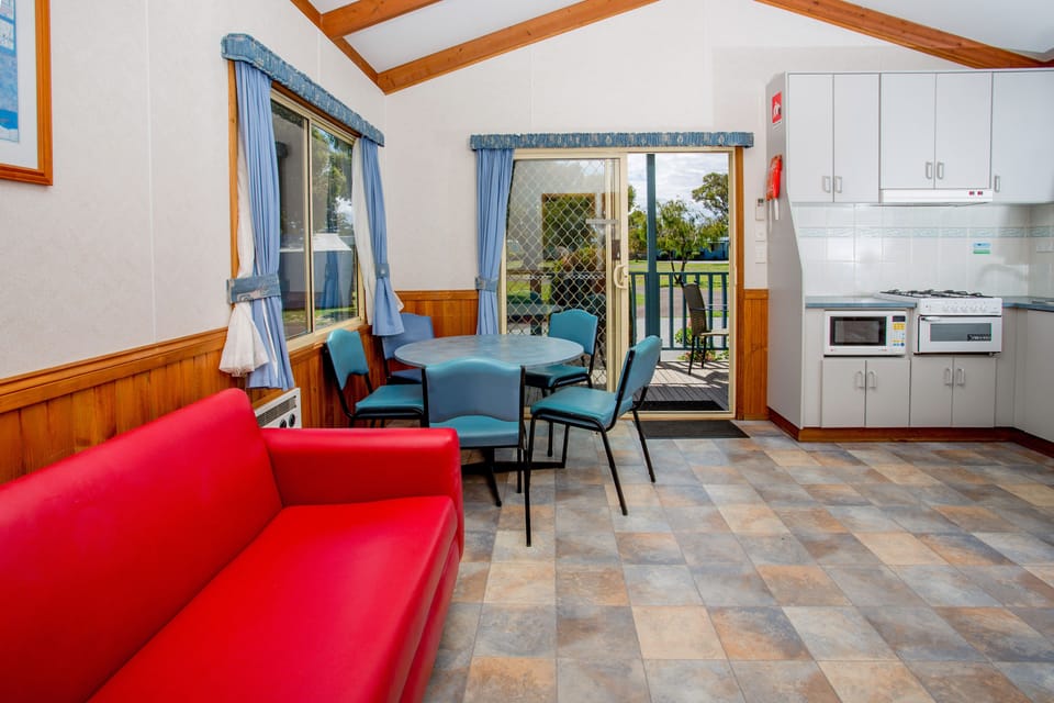 2 Bedroom Cabin - Ibis | Living area | Flat-screen TV, DVD player