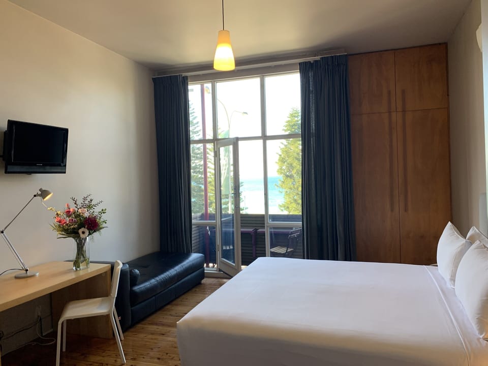 Room, Ocean View | Iron/ironing board, WiFi (free), bed sheets