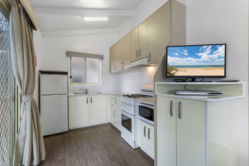 Standard Cabin, 2 Bedrooms | Private kitchen | Full-size fridge, microwave, oven, stovetop