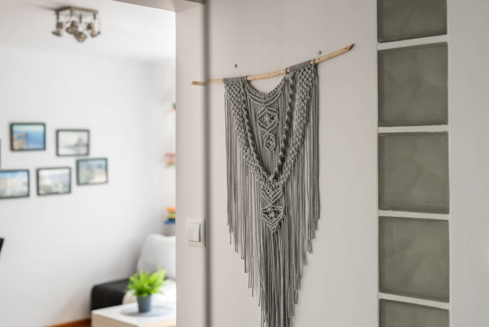 Decorative wall art and modern details adding charm to the hallway area.

