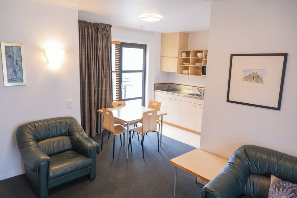 Apartment, 2 Bedrooms (1 Queen and 2 Single beds) | Living area | LED TV