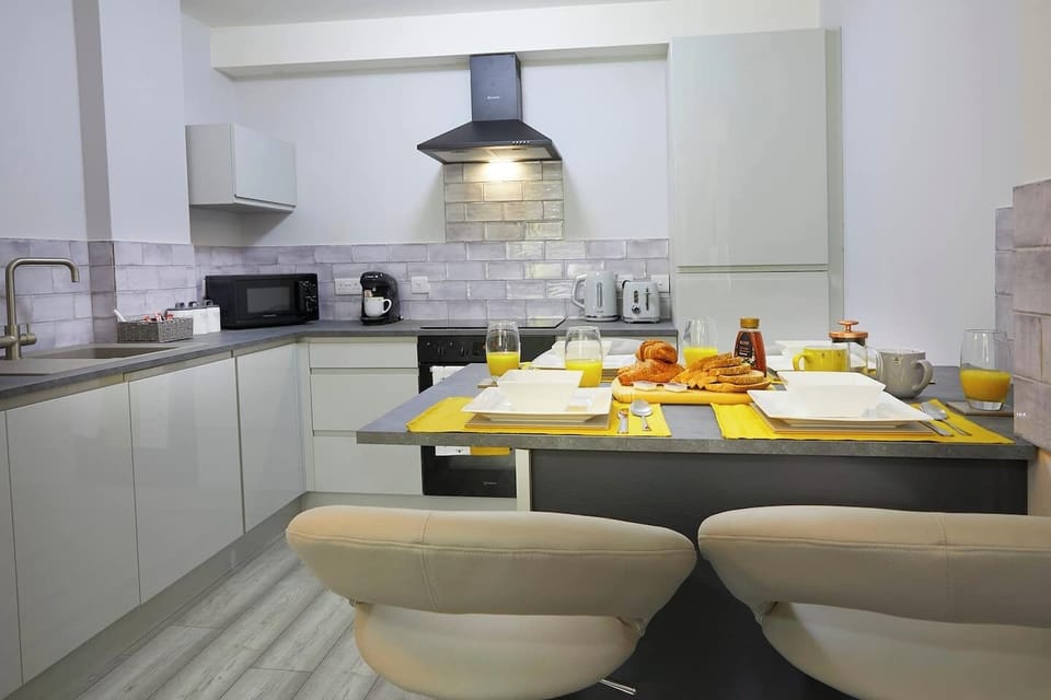 Intimate dining experience: A cozy setting for two with a fully equipped kitchen
