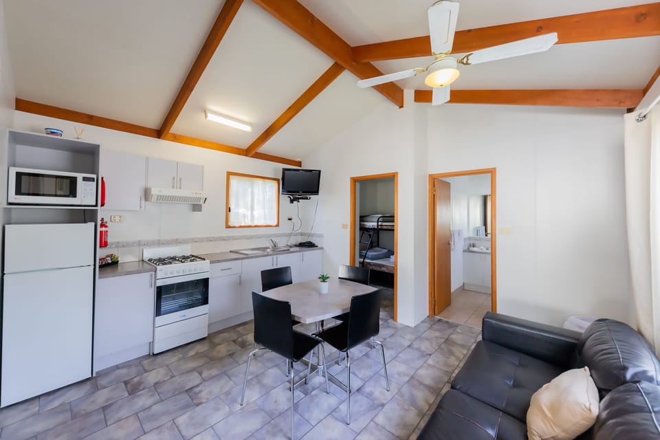Standard Cabin | Private kitchen | Fridge, stovetop, cookware/dishes/utensils