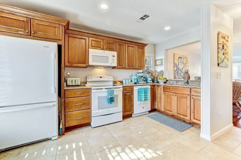 This kitchen is equipped to assist you with any culinary need.