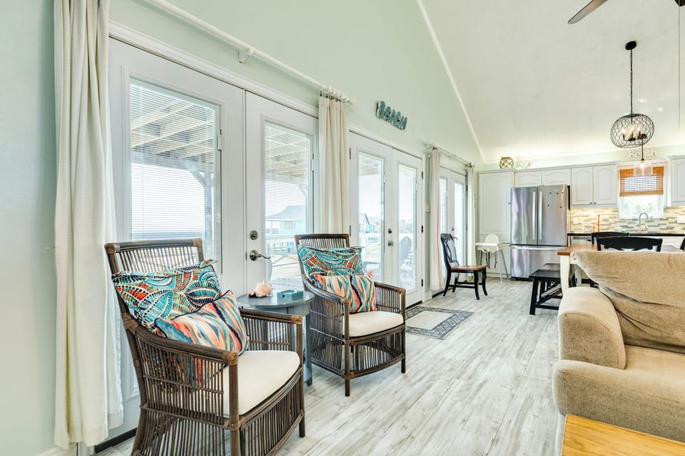 Enjoy morning coffee or card games at the small sitting area