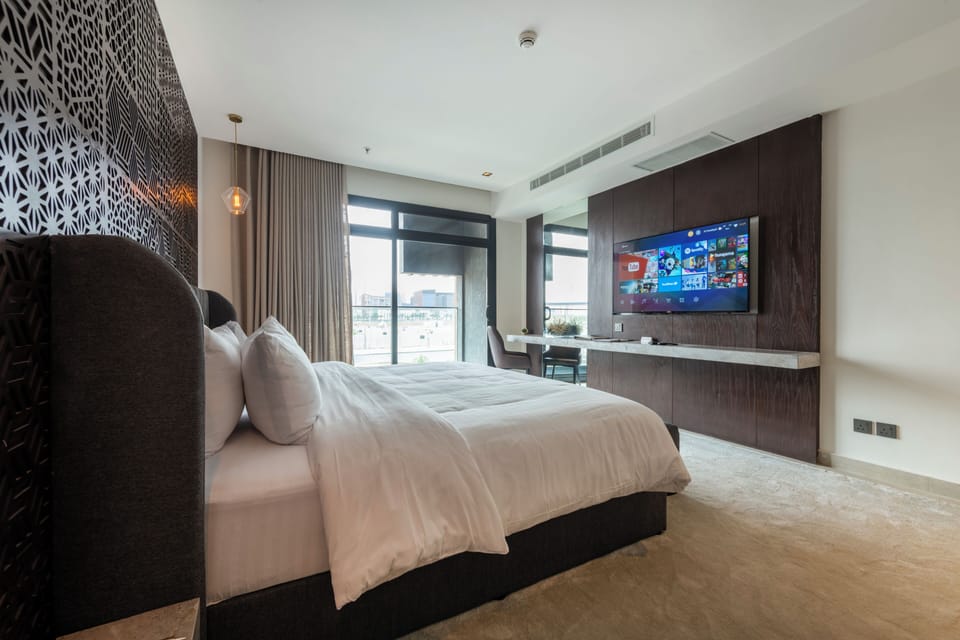 Two bedroom suite | Minibar, in-room safe, iron/ironing board, free WiFi