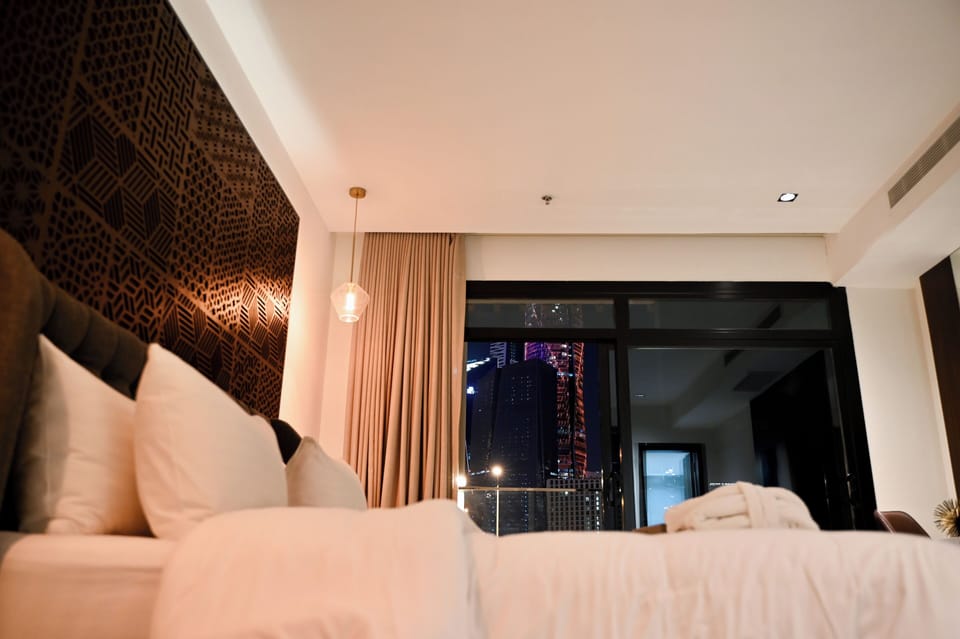 Suite with balcony | Minibar, in-room safe, iron/ironing board, free WiFi