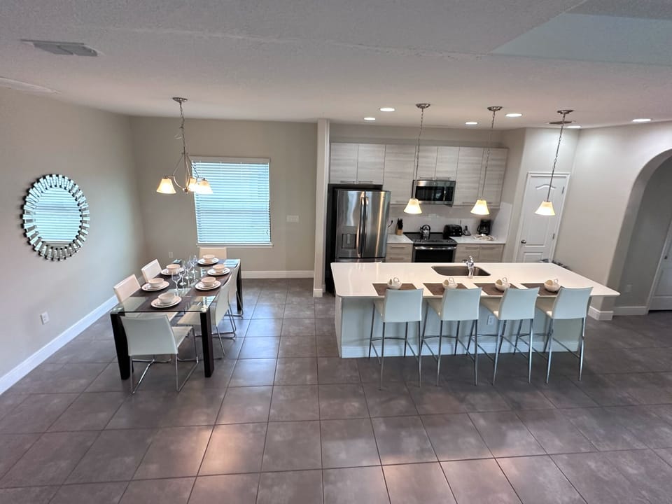 Floor, Dining Room, Dining Table, Furniture, Indoors