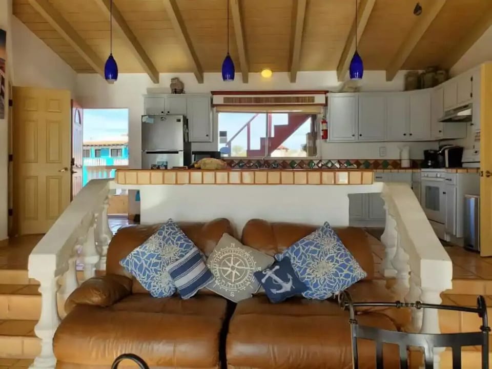 Kitchen with vaulter beam ceilings