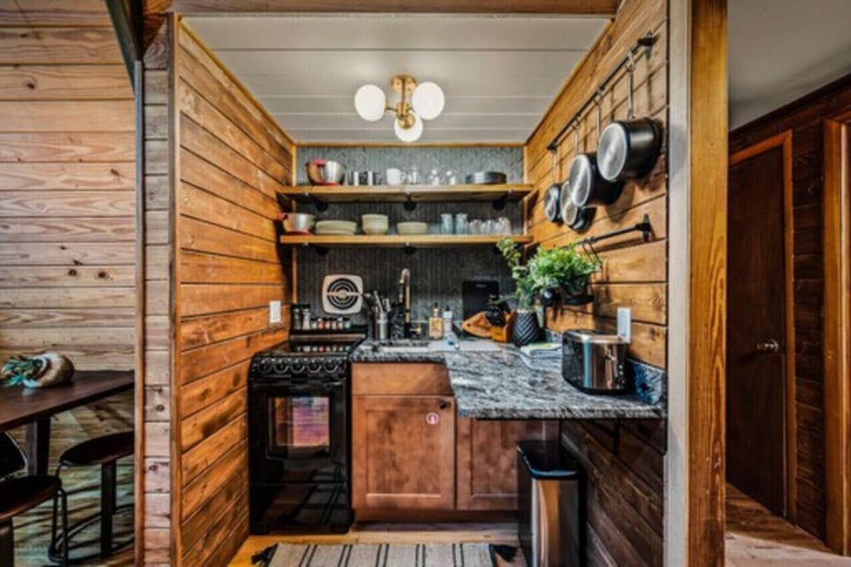 Compact kitchen packed with the essential amenities for a cooking experience