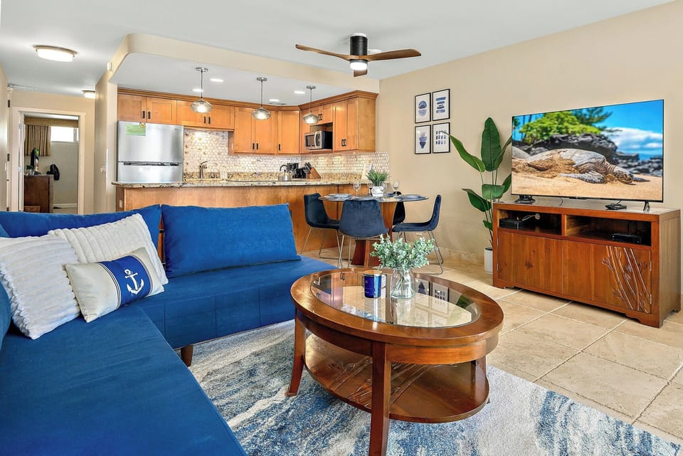 Contemporary blue accents and smart TV for laid-back evenings after beach days