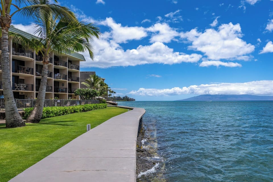 Ocean wall and lush tropical grounds just steps from your lanai