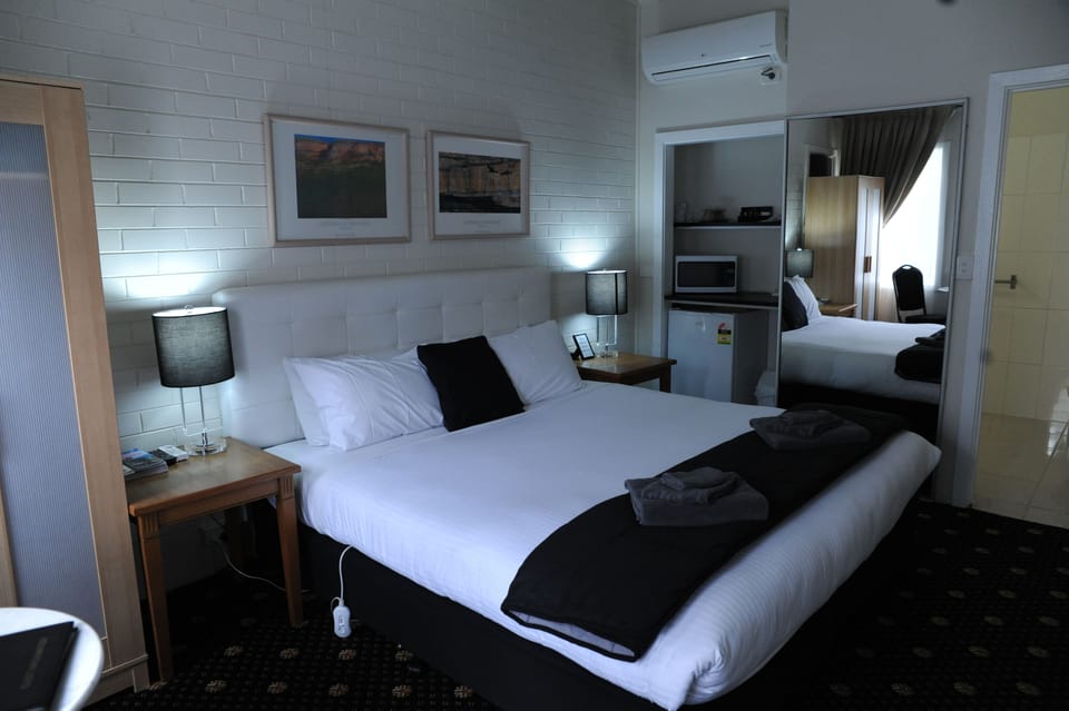 King Room (Wheelchair-Friendly) | Premium bedding, pillowtop beds, blackout drapes, iron/ironing board