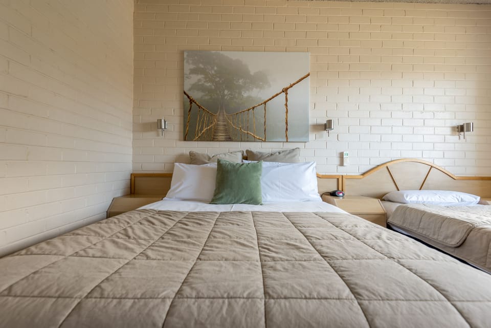 Twin room with one Queen Bed and one Single Bed | Iron/ironing board, free WiFi