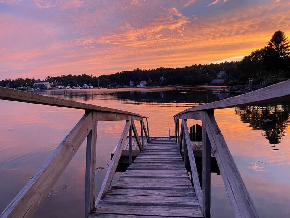 Enjoy beautiful sunsets over Mill Cove - just a short walk to the downtown center