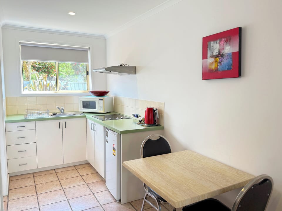 Fridge, coffee/tea maker, electric kettle, toaster