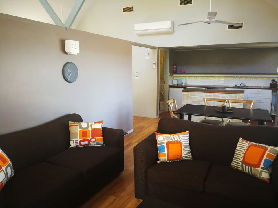 Standard Suite, 2 Bedrooms, Non Smoking, Kitchen (Villa) | Living room | 32-inch TV with digital channels