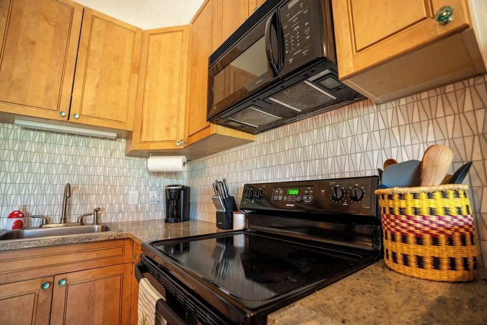 We love this little condo because it has a full kitchen, with full sized appliances and large counter spaces. I brought back this utensil holder from Arusha after summiting Kilimanjaro!