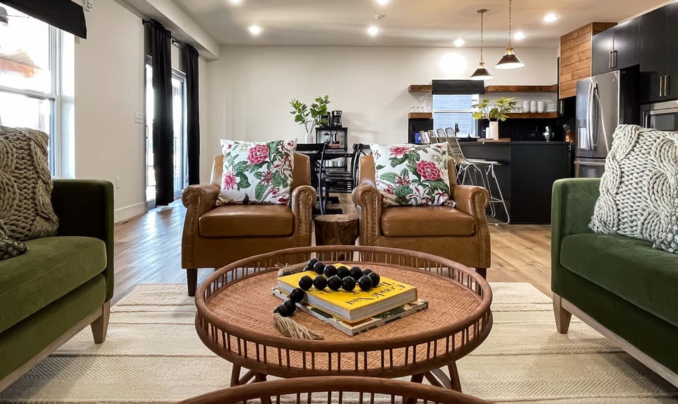 2 leather seats and open concept to dining room/kitchen