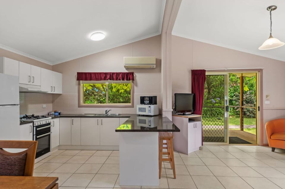 Deluxe 3 Bedroom Spa Villa | Private kitchen | Full-size fridge, microwave, oven, stovetop