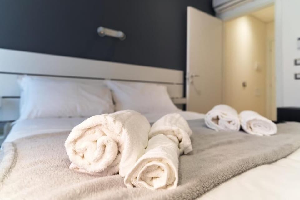 Premium bedding, down comforters, individually decorated