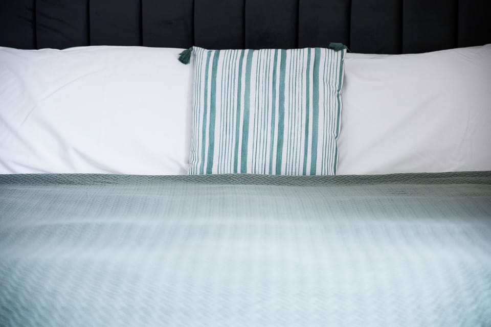 Blackout drapes, travel crib, free WiFi, bed sheets