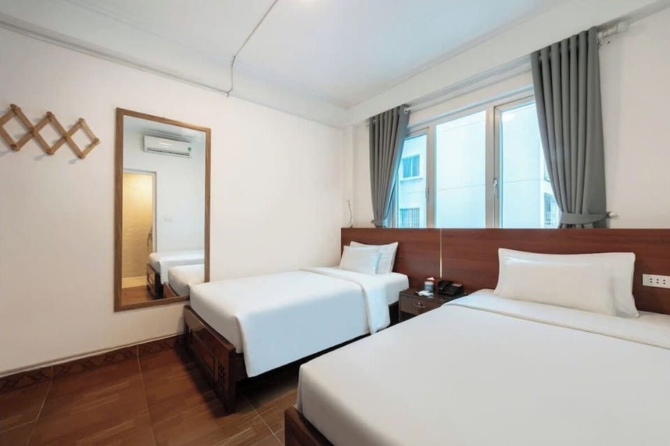 Superior Twin Room | Minibar, in-room safe, blackout drapes, iron/ironing board