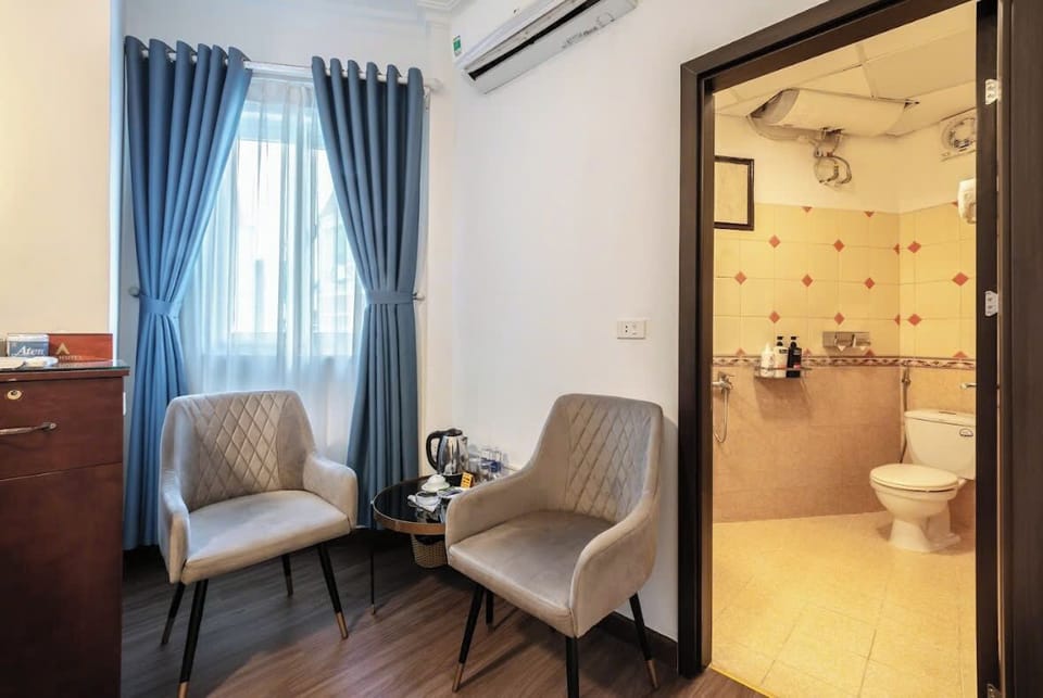 Standard Double | Minibar, in-room safe, blackout drapes, iron/ironing board