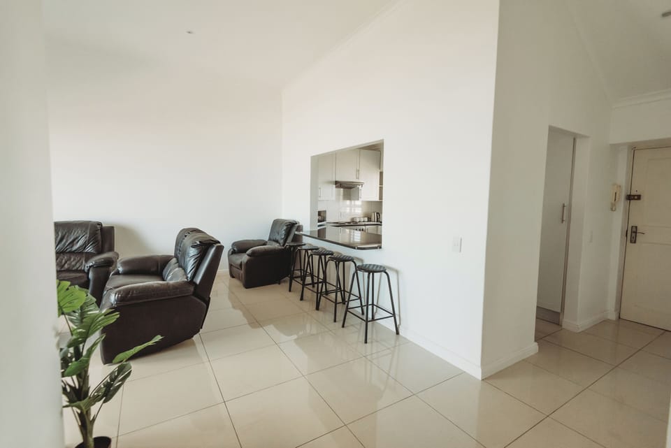 Living room with kitchen access