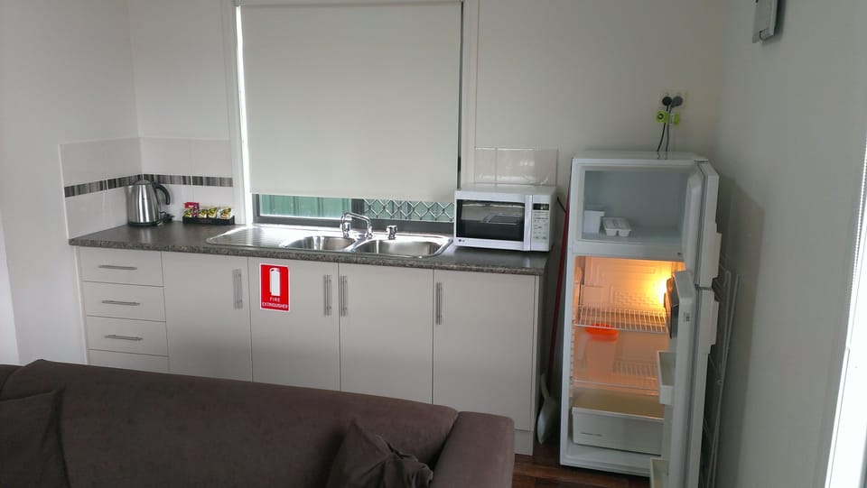 Family Villa | Private kitchenette | Fridge, microwave, electric kettle, toaster