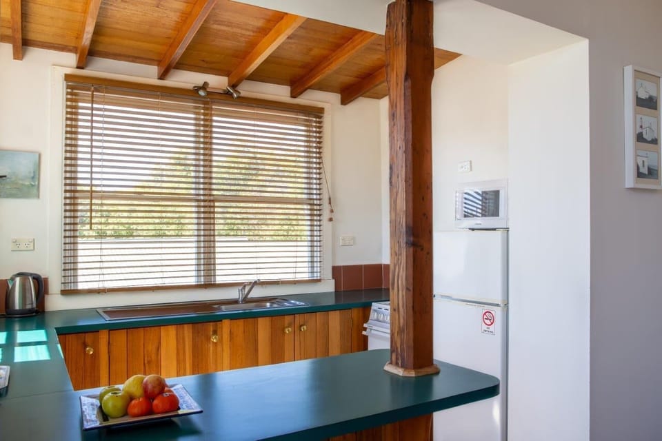 Apartment, 2 Bedrooms, Balcony | Private kitchen | Full-size fridge, microwave, stovetop, coffee/tea maker
