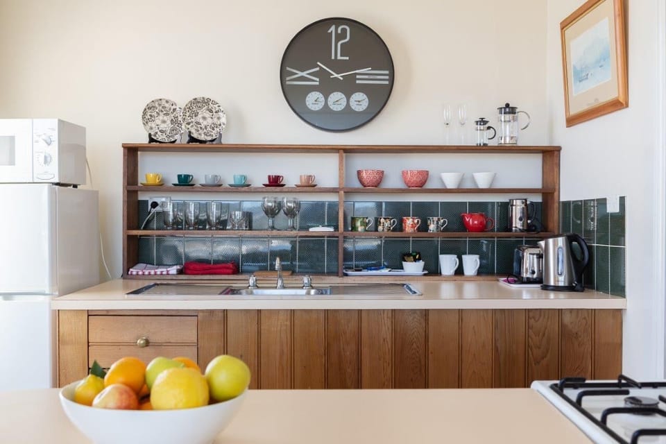 Penthouse | Private kitchen | Full-size fridge, microwave, stovetop, coffee/tea maker