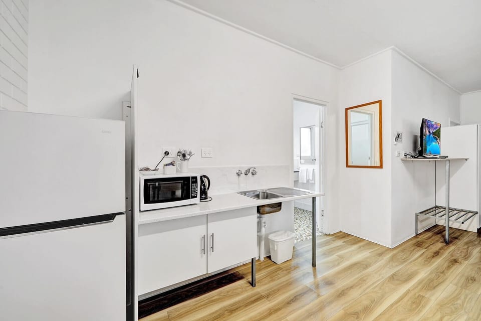 Family Room, Multiple Beds | Private kitchenette | Coffee/tea maker, fridge, microwave, electric kettle