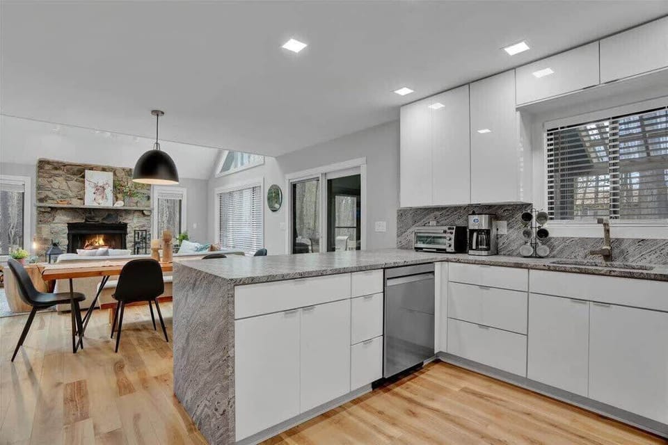 Bright White Kitchen with Granite Counters