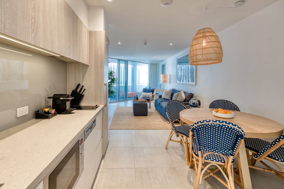 One Bedroom Partial Beach View | Private kitchenette | Full-size fridge, microwave, stovetop, dishwasher