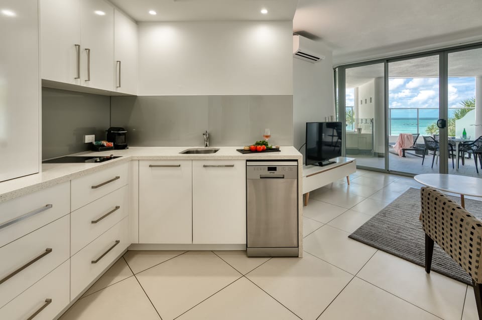 One Bedroom Beachfront Spa | Private kitchenette | Full-size fridge, microwave, stovetop, dishwasher