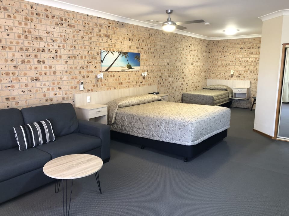 Family Room, Multiple Beds (Large Family Suites) | Minibar, desk, laptop workspace, blackout drapes