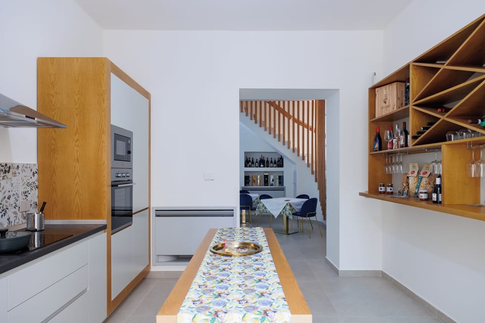 Family Apartment (LA DUCHESSA) | Private kitchen | Electric kettle, dining tables