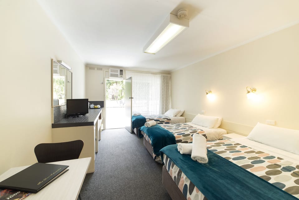Budget Room for 4 | Desk, soundproofing, iron/ironing board, cribs/infant beds