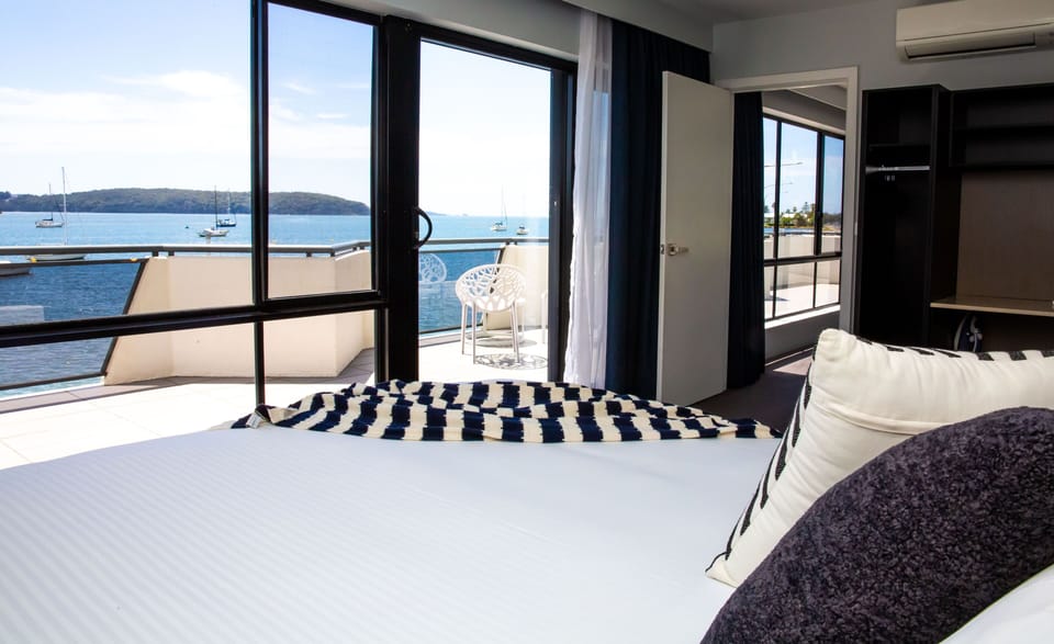 Executive Suite, Ocean View | Desk, iron/ironing board, WiFi (free), bed sheets